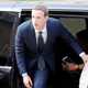 Facebook CEO Mark Zuckerberg climbing out of a van at the Elysee Palace in Paris, 2018.